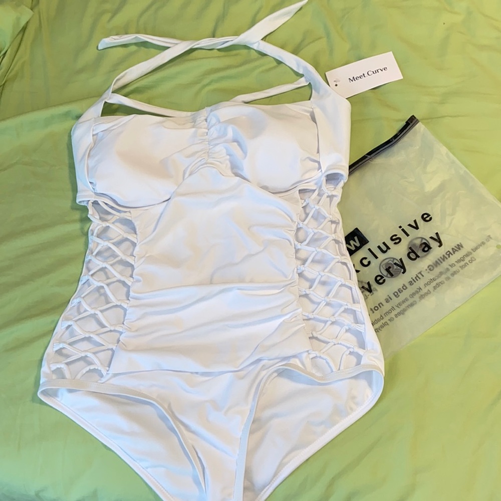 NWT one piece white bathing suit.